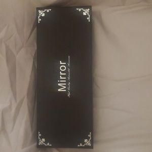 Car's Pink Rhinestone rear view mirror.